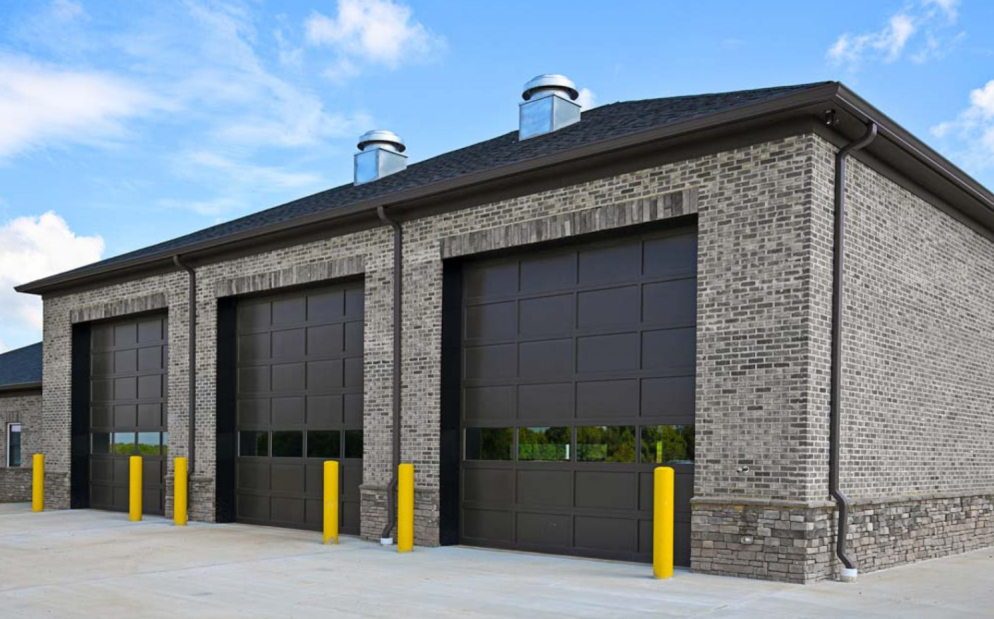 Commercial garage door in Sapphire Shores, expertly repaired and functional, showcasing reliable garage door repair services