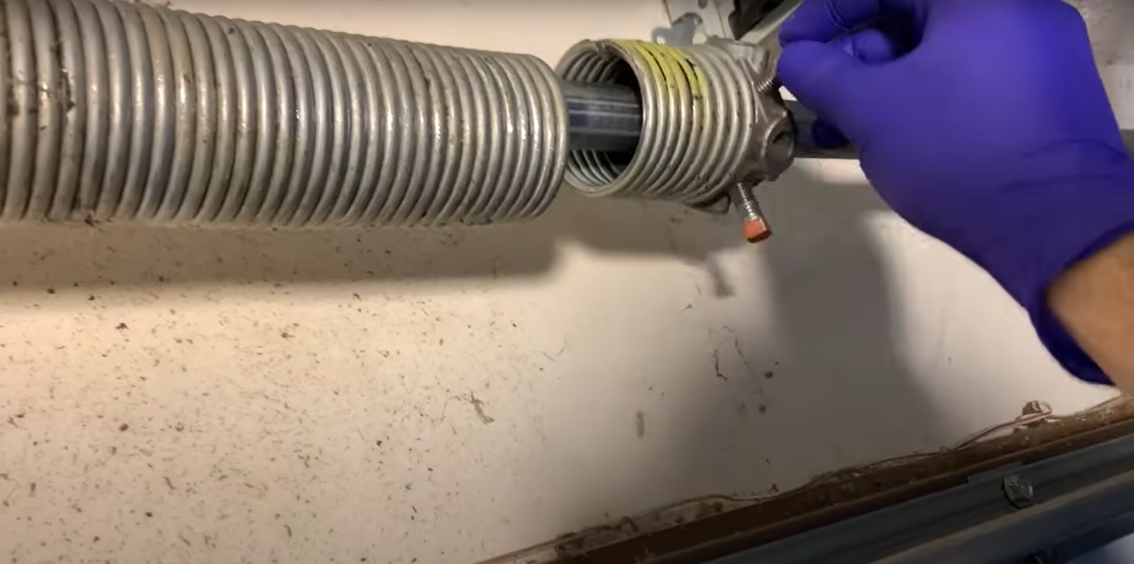 Garage door spring repair by experts of Garage Door Repair Sapphire Shores.