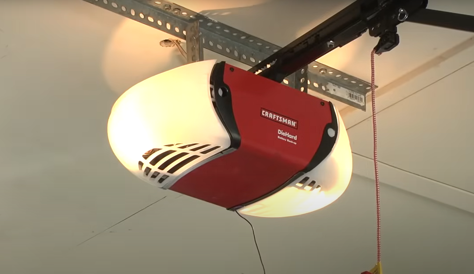 Professional technician repairing a garage door opener in Sapphire Shores for garage door repair services.