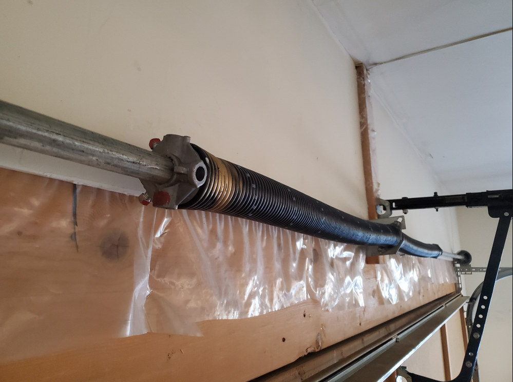 How to Identify a Broken Spring on a Torsion System